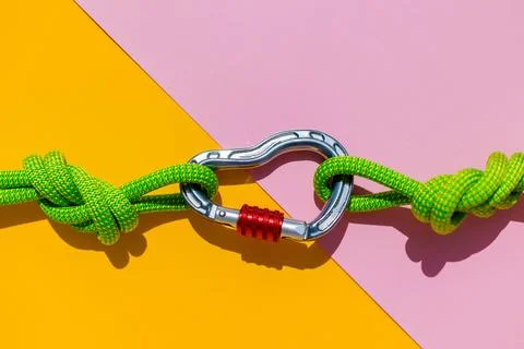 Two ropes with secure knots are connected by a carabiner. Equipment for rock  Stock Photos