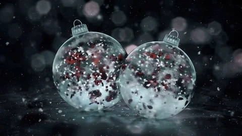 Two Rotating Christmas Grey Noir Ice Glass Baubles red petals background loop Stock Footage 82431620
