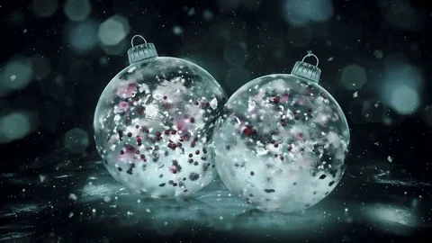 Two Rotating Christmas Grey Noir Ice Baubles colorful petals background loop Stock Footage 82431713