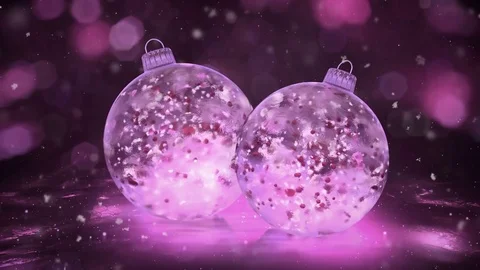 Two Rotating Christmas Pink Ice Baubles snow colorful petals background loop Stock Footage 82437003