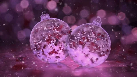Two Rotating Christmas Pink Ice Glass Baubles snow red petals background loop Video stock 82437026