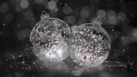 Two Rotating Christmas White Ice Glass Baubles snow red balls background loop Stock Footage 82435271