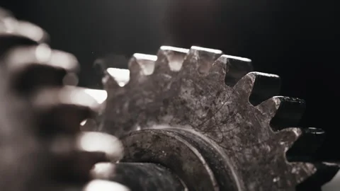 Two rotating metal gears. Stock Footage 277598885