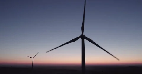 Two rotating propellers of wind turbines on the background of the night sky. Stock Footage 165554274