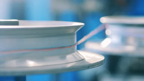 Two rotating pulleys with electrical wire Stock Footage 153225242