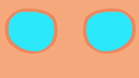 Two round, blue eyes with thick black eyelashes blink open against a peach Stock Footage 292688155