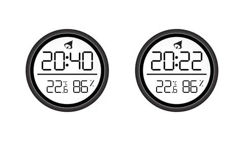 Two round digital clocks displaying time temperature and humidity in black and Stock Illustration