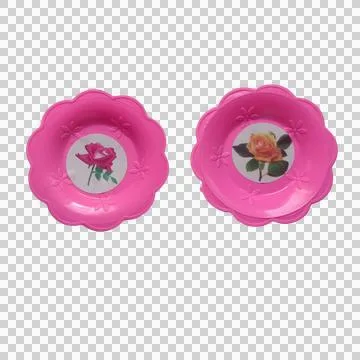 Two round pink plastic plates with colorful floral flower patterns isolated.. Stock Photos