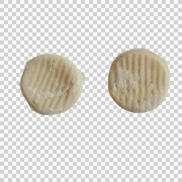 Two round shortbread cookies with textured stripes isolated on a transparen.. Фото