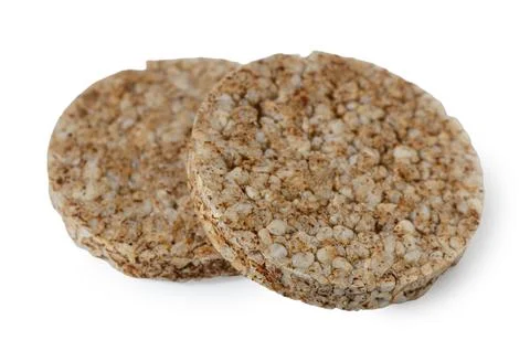 Two round whole grain rice cakes on a white background Stock Photos