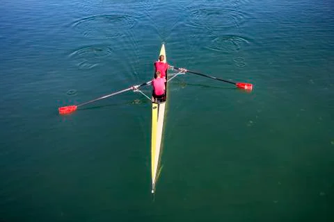 Two rowers in a boat Stock Photos