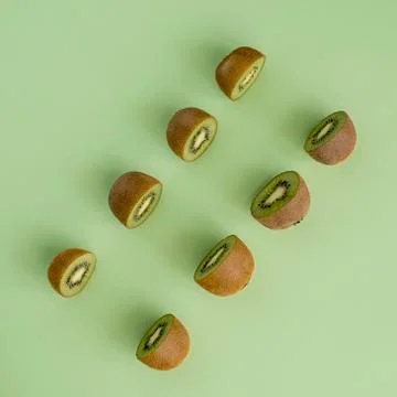 Two rows of cut kiwi Stock Photos