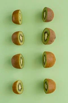 Two rows of cut kiwi Stock Photos
