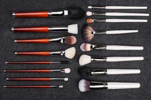 Two rows of makeup brushes Stock Photos