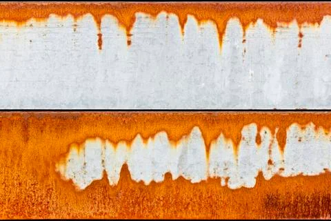 Two Rows of Rust on a Garage Door Stock Photos