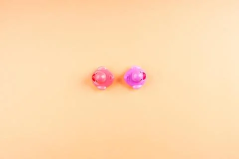 Two rubber ducks looking in opposite directions Stock Photos