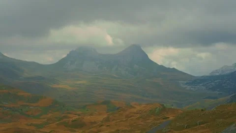 Two rugged mountain peaks shrouded in clouds in Durmitor National Park Vídeos de archivo 342800510