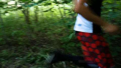 Two runners in the forest Jumping nowhere Video stock 93846362