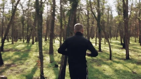 Two runners jogging in autumn park Stock Footage 82633885