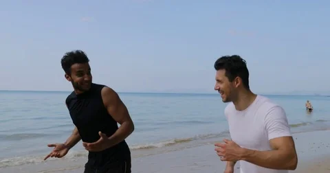 Two Running Man On Beach Talking Young Guys Athlete Jogging Training Outdoors Stock Footage
