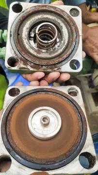 Two rusty mechanical components showing wear and tear, likely from machiner.. Stock Photos