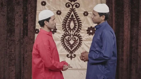Two sad muslim men talking to each other Stock Footage 236618247