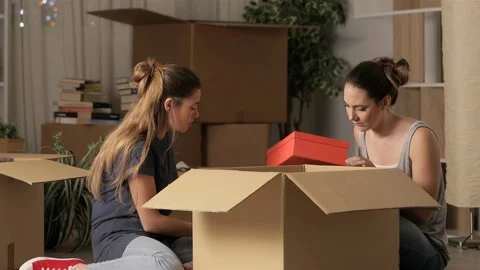 Two sad roommates moving home after eviction Stock Footage 106861133
