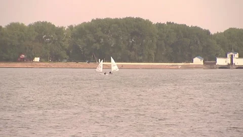 Two sailboat divide to the waves Stock Footage 94875893