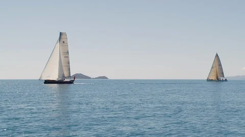 Two sailboats on the ocean Stock Footage 91396598
