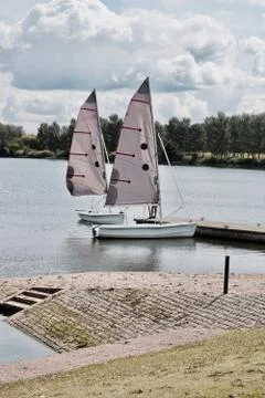 Two sailboats on the water Stock Photos