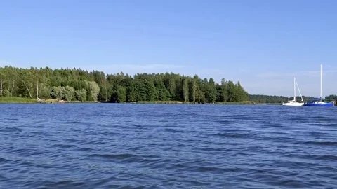 Two sailing boats on the deep blue Baltic sea on a summer day Stock-Footage 69878581
