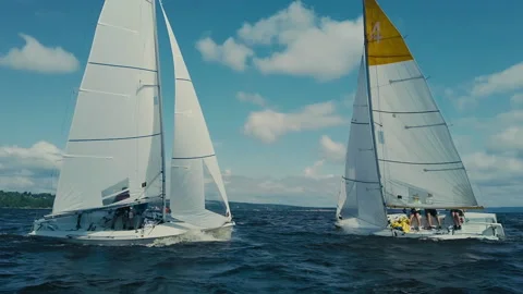 Two sailing boats move along river towards each other and pass the side against. Stock Footage 160601167