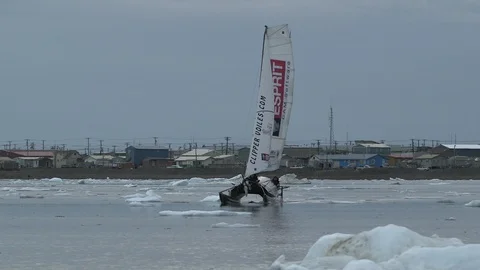 Two sailing on a catamaran in front of Barrow, Alaska Stock Footage 104955258