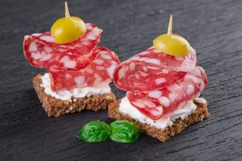 Two salami canapes Foto stock
