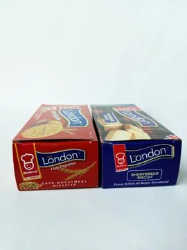 Two same brand boxes of London biscuits on white background. 스톡 사진
