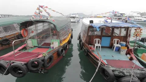 Two Sampans Moored in Sai Kung Harbour Stock Footage 230186952