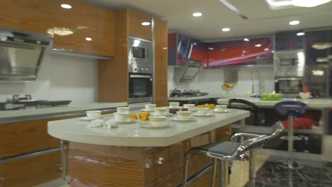 Two sample kitchens in a home store showroom fully furnished. Stock Footage 97569423