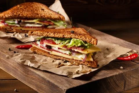 Two sandwich on old papper Stock Photos