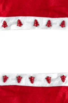 Two Santa Claus red hat with furry lying symmetrically on white background as 库存照片
