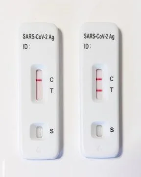 Two sars cov 2 antigen rapid diagnostic test showing positive result Stock Photos