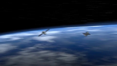 Two satellites quickly approaches and flies to the right. The satellite scan and Stock Footage 87295486