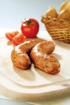 Two sausages with vegetable Stock Photos