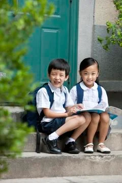 Two school children studying outside Stock Photos