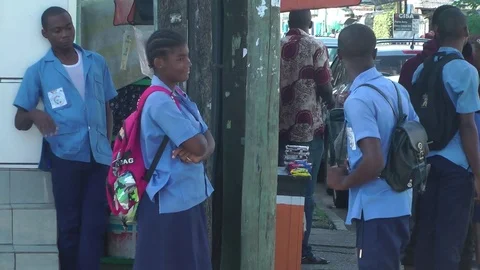 Two school kids chatting Stock Footage 81047417