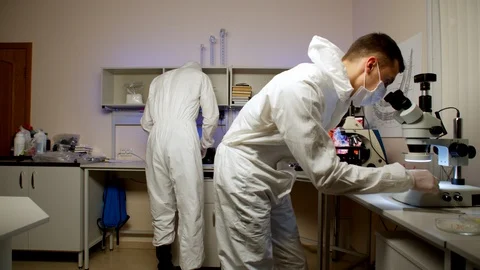 Two scientists celebrating test result Stock Footage 127561324