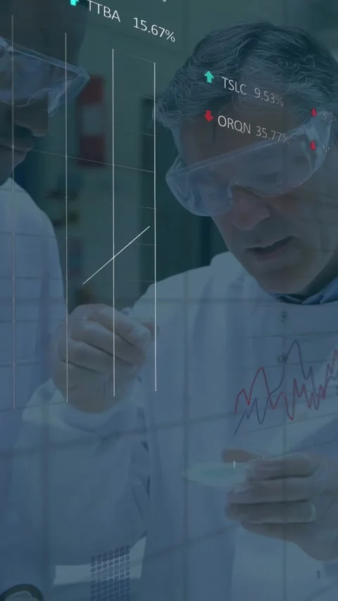 Two scientists scooping sample into dish in lab, with data overlay fading in Stock Footage 332598403