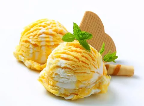Two scoops of lemon ice cream with wafer Stock Photos