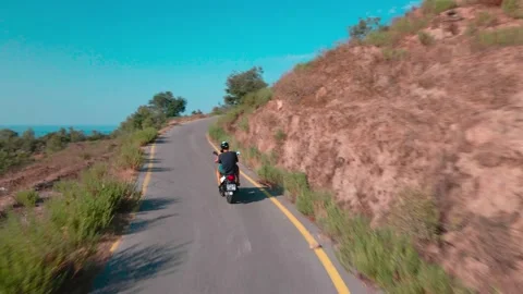 Two on a scooter Stock Footage 142135181