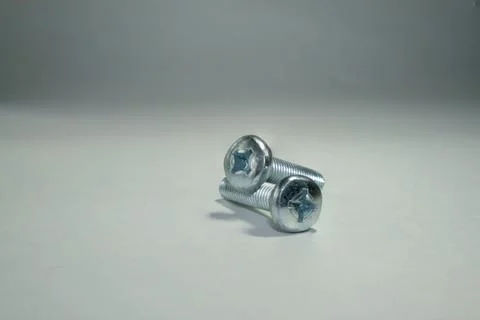 Two screws on a white background Foto stock