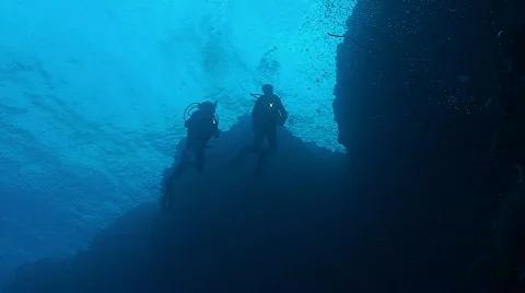 Two scuba divers at coral reef, overhead shot, red sea Stock Footage 435357